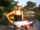 Girl With Striped Catfish.